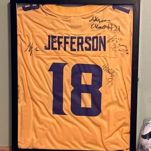 Justin Jefferson framed signed by 4 Vikings players especially there head coach